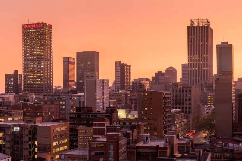 Panoramic view of the Johannesburg city skyline at sunset